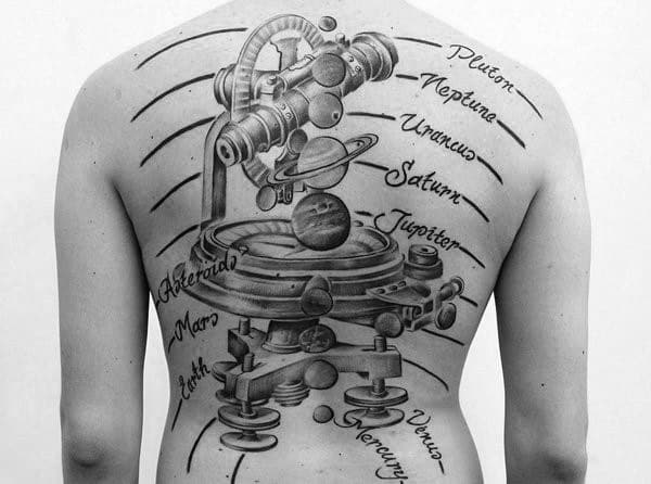 man with microscope and planets tattoo full back