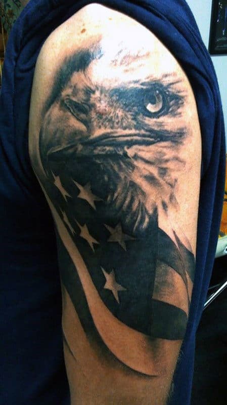 Man With Military War Tattoo Of Bald Eagle And US Flag