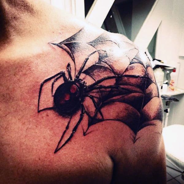 Man With Monstrous Spider Tattoo On Shoulder