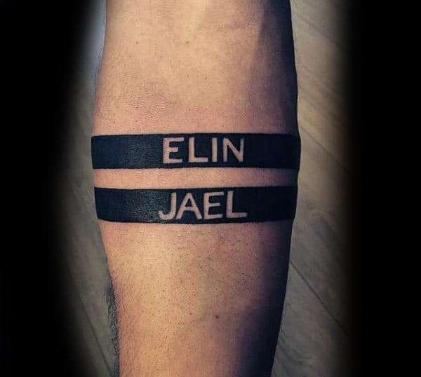 Man With Negative Space Black Ink Armband Name Tattoo