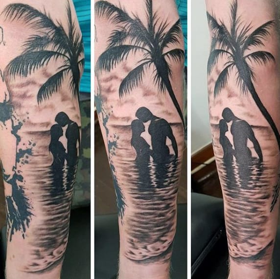 Man With Ocean Themed Tattoos Of Beaches On Forearm