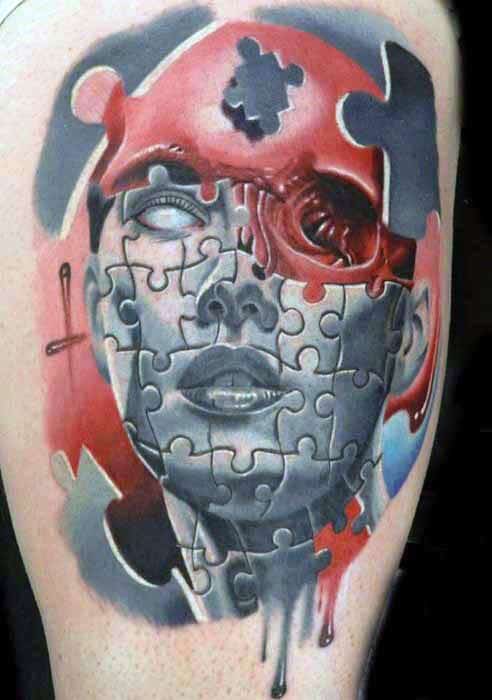 Man With Portrait Red Ink Puzzle Thigh Tattoo