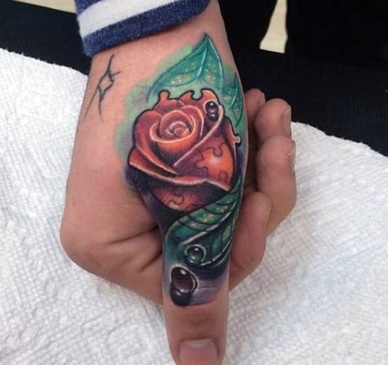 Man With Puzzle Piece Rose Flower Thumb Tattoo