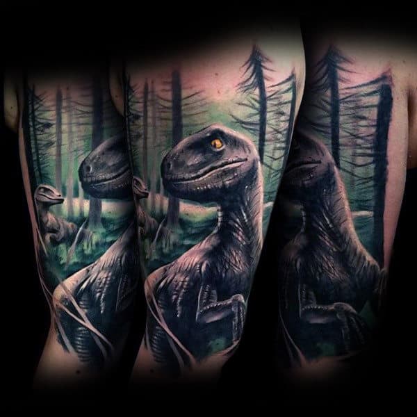 Man With Realistic Dinosaurs And Trees Tattoo On Forearms