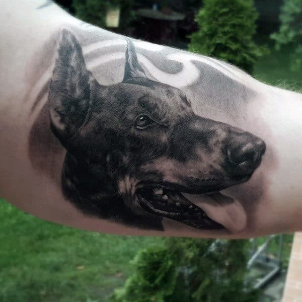 Man With Realistic Dog Animal Bicep Tattoo