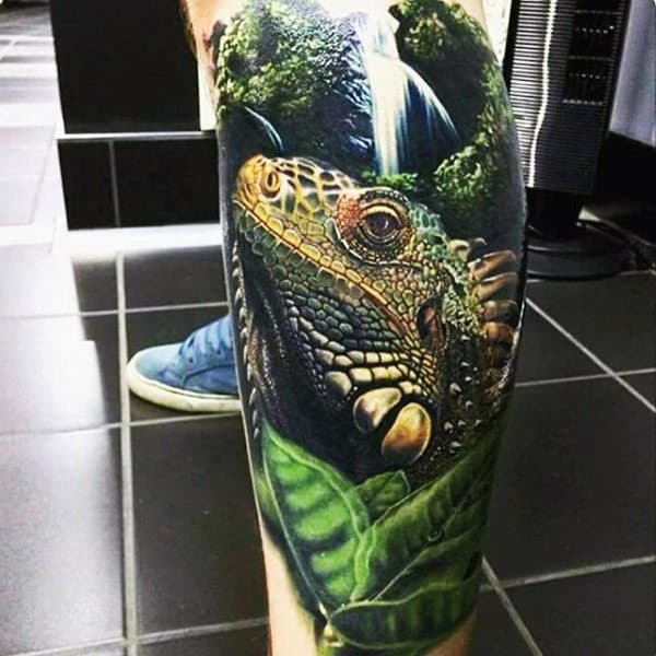 Man With Realistic Green Lizard In Jungle Leg Sleeve Animal Tattoo