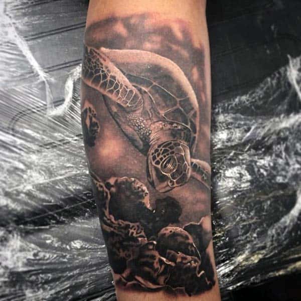 Man With Realistic Turtle In Water Forearm Tattoo