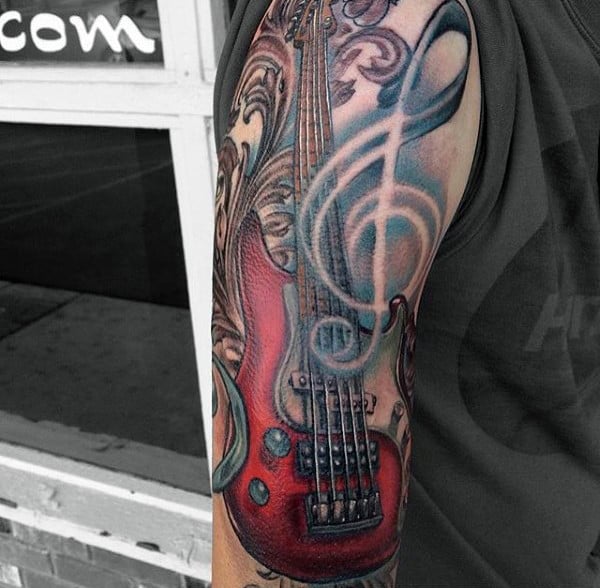 Man With Red Guitar Tattoo On Arms