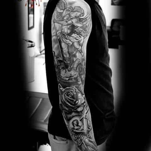 Man With Religious Tattoo On Sleeves
