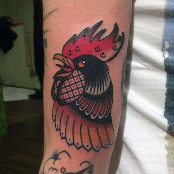 Man With Rooster Tattoo On Forearm In Neo Traditional Style