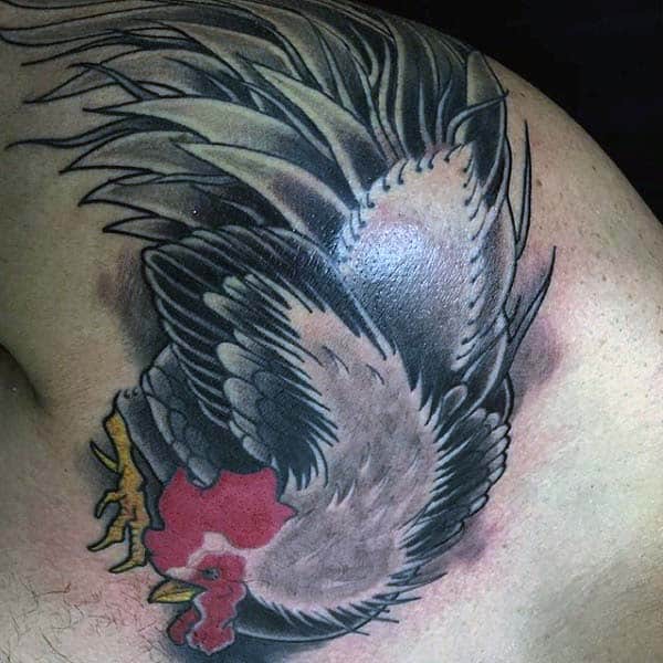 Man With Rooster Tattoo On Shoulder In Traditional Style