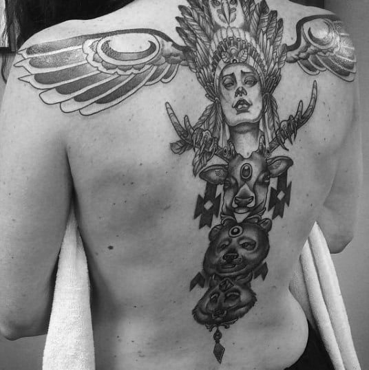 Man With Shaded Realistic Nefertiti Head Totem Pole Tattoo On Back