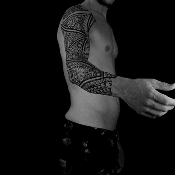 Man With Sleeve Tattoo Samoan Tribal Design With Black And Grey Ink Patterns