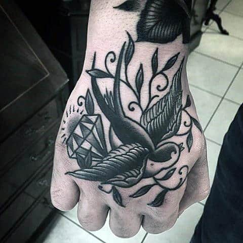 Man With Sparrow And Diamond Tradtional Hand Tattoo