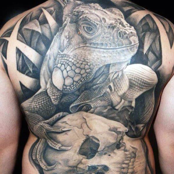 Man With Spectacular Grey Black Lizard Back Tattoo Design