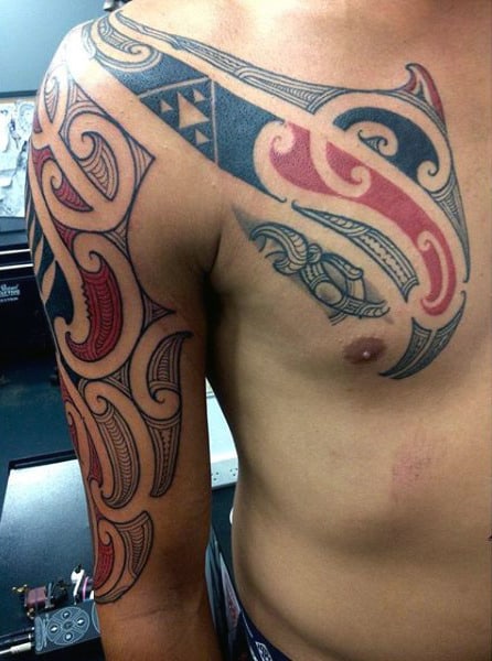 Man With Tangata Whenua Maori Half Sleeve And Chest Tattoos