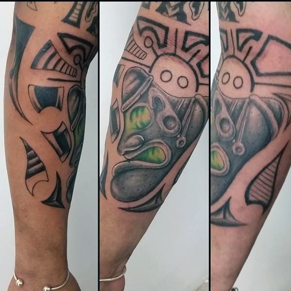 Man With Tribal Taino Forearm Tattoo Ideas