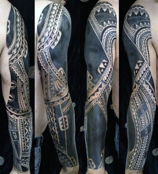 Man With Tribal Tattoos Full Sleeve