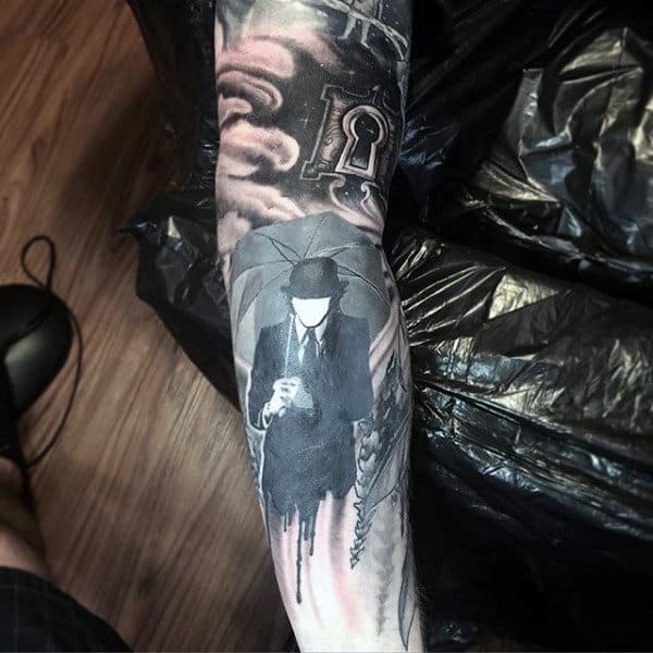Man With Umbrella Cloud Tattoo On Forearm