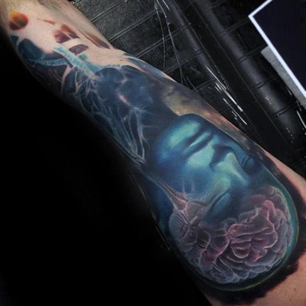 Man With Unusual X Ray Brain Leg Sleeve Tattoo