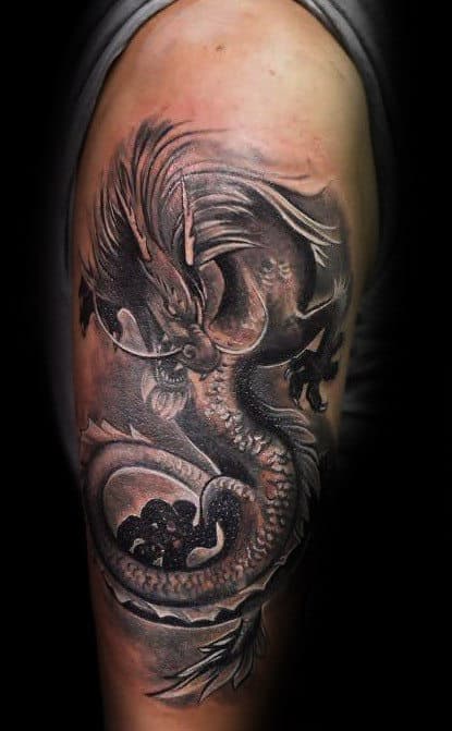 Man With White And Grey Ink Flying 3d Dragon Arm Tattoo