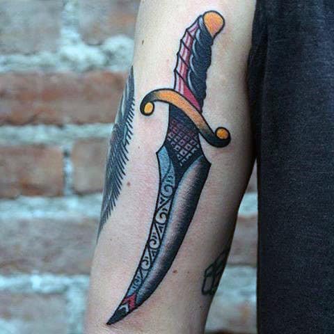 50 Amazing Sword Dagger and Knife Tattoo Designs  TattooBlend