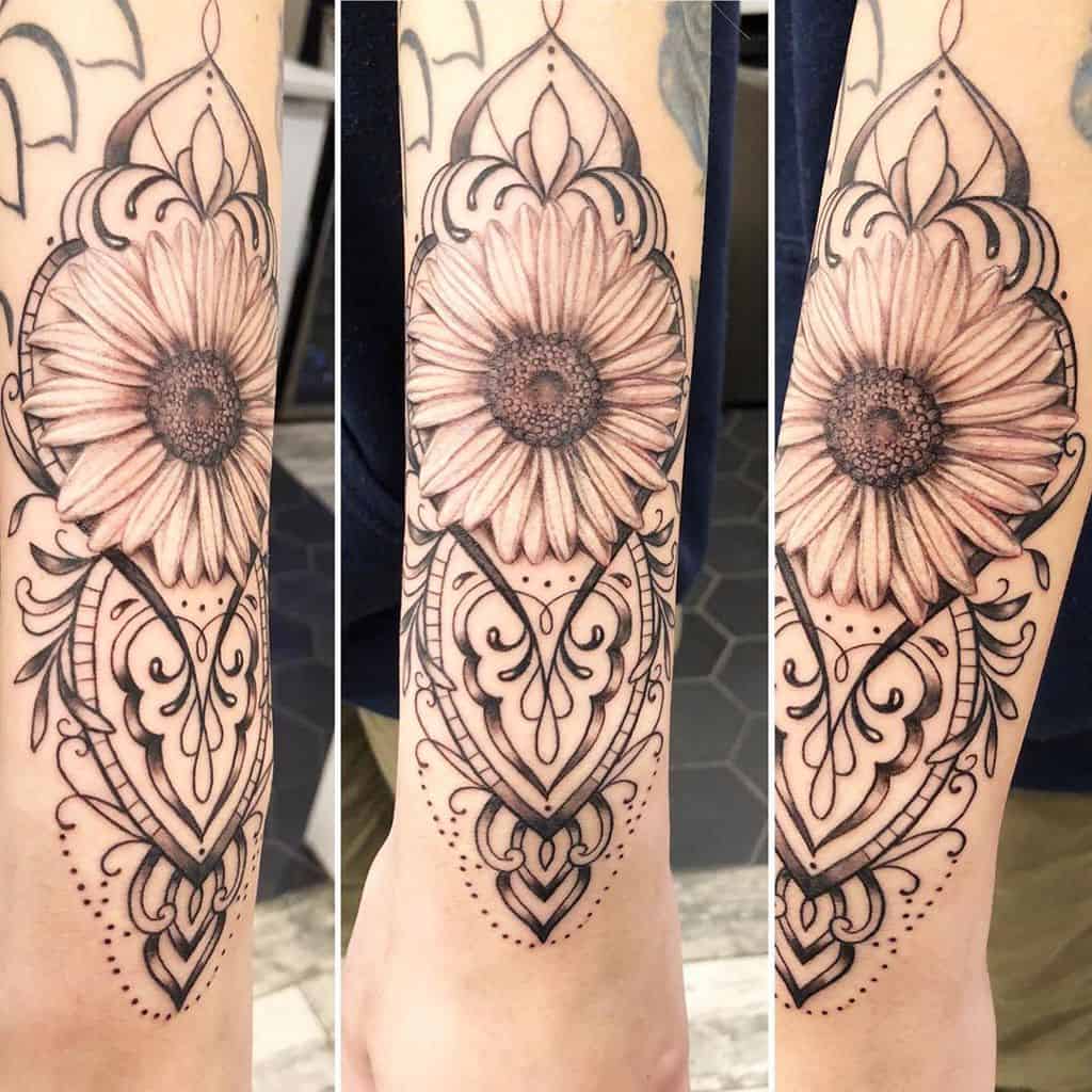Forearm tattoo black and grey fine line mandala illustrative daisy