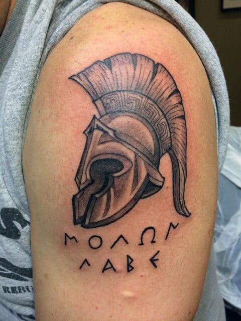 Manly Greek Phrase Molon Labe Upper Arm Male Tattoo With Helmet Design
