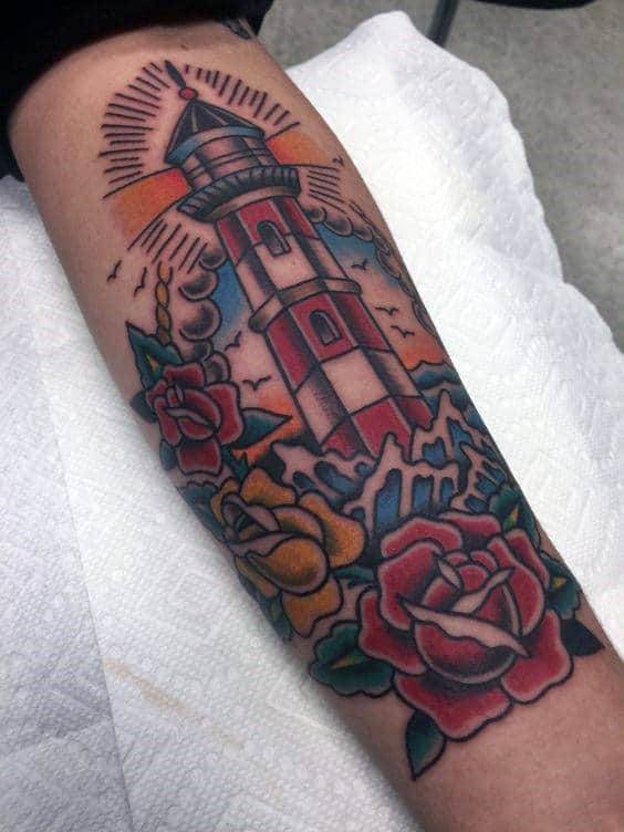 Manly Inner Forearm Rose Flower With Lighthouse Male Traditional Tattoo Ideas