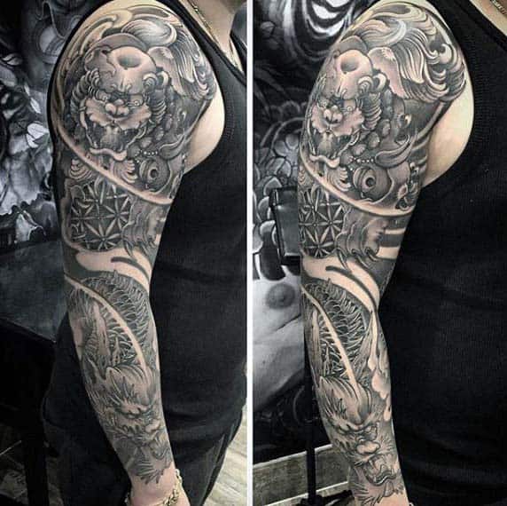 Grey Ink Japanese Dragon Tattoo On Sleeve Tattoo Viewer Com