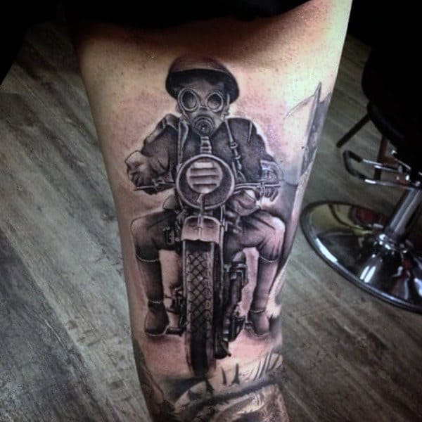 Manly Motorcycle Rider Wearing A Protective Gas Mask Tattoo On Mans Leg