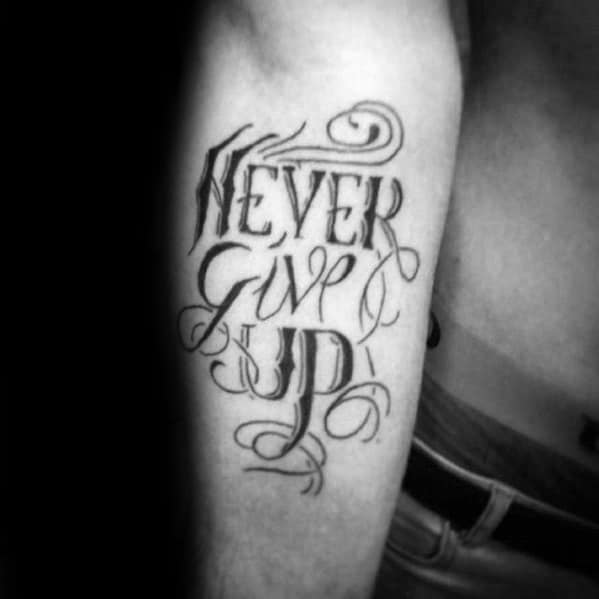 60 Never Give Up Tattoos For Men  Phrase Design Ideas