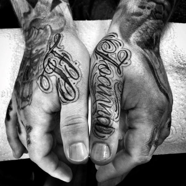 Manly Script Thumb Tattoos For Guys