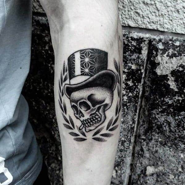 manly-skull-with-top-hat-tattoo-design-ideas-for-men-on-outer-forearm