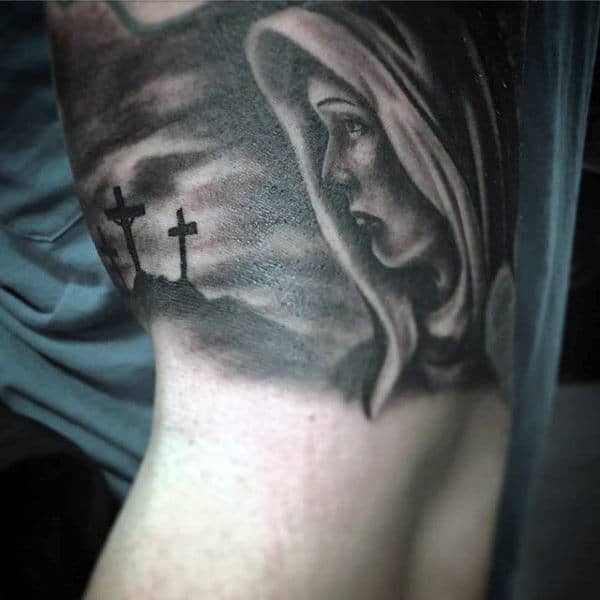 Mary With Jesus On The Cross Mens Bicep Tattoos