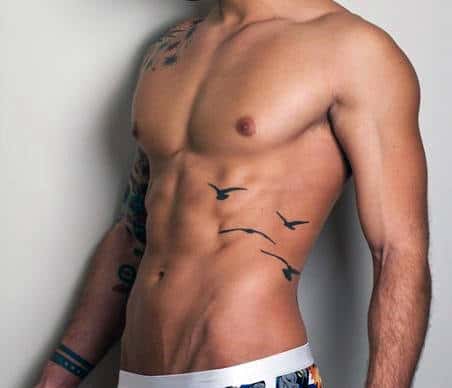 Masculine Bird Tattoos For Men On Side Rib Cage