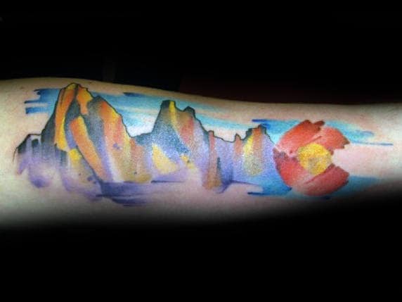 Masculine Colorado Mountains Watercolor Tattoo On Guy