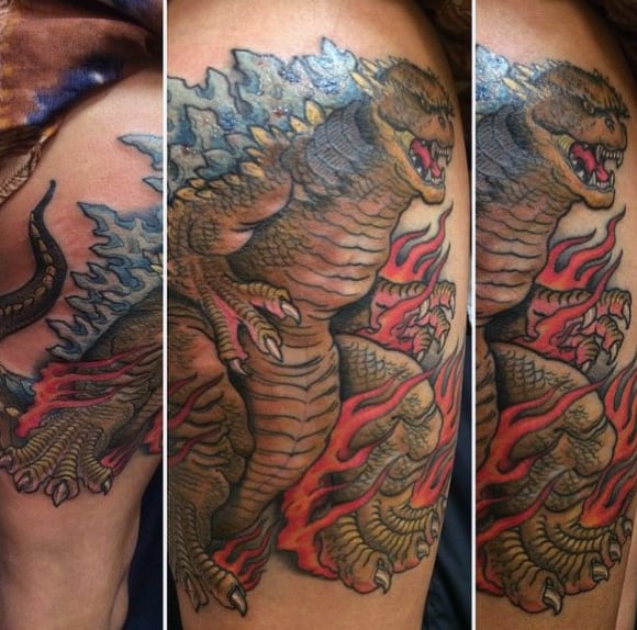 Masculine Old School Tattoo Of Godzille With Flames On Man