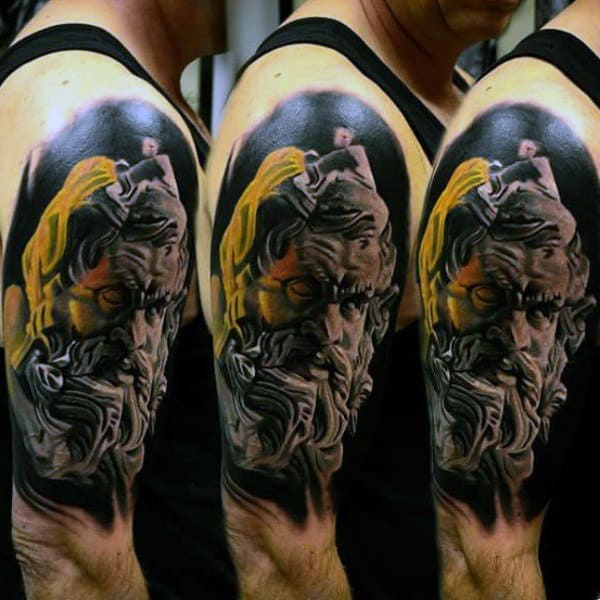 masculine zeus tattoo design inspiration for men on upper arm