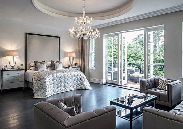 elegant master bedroom with sofas