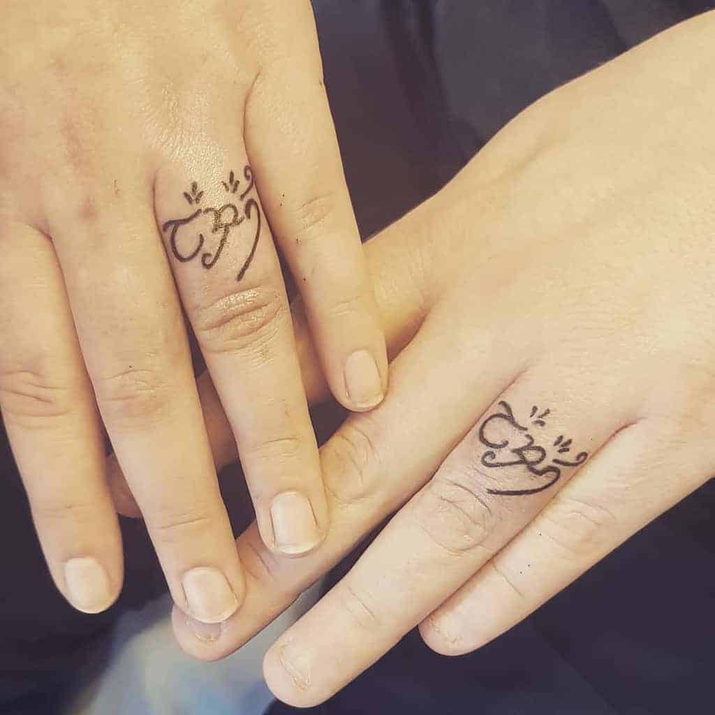 matching-themed-wedding-ring-tattoo-ddraigpoppy
