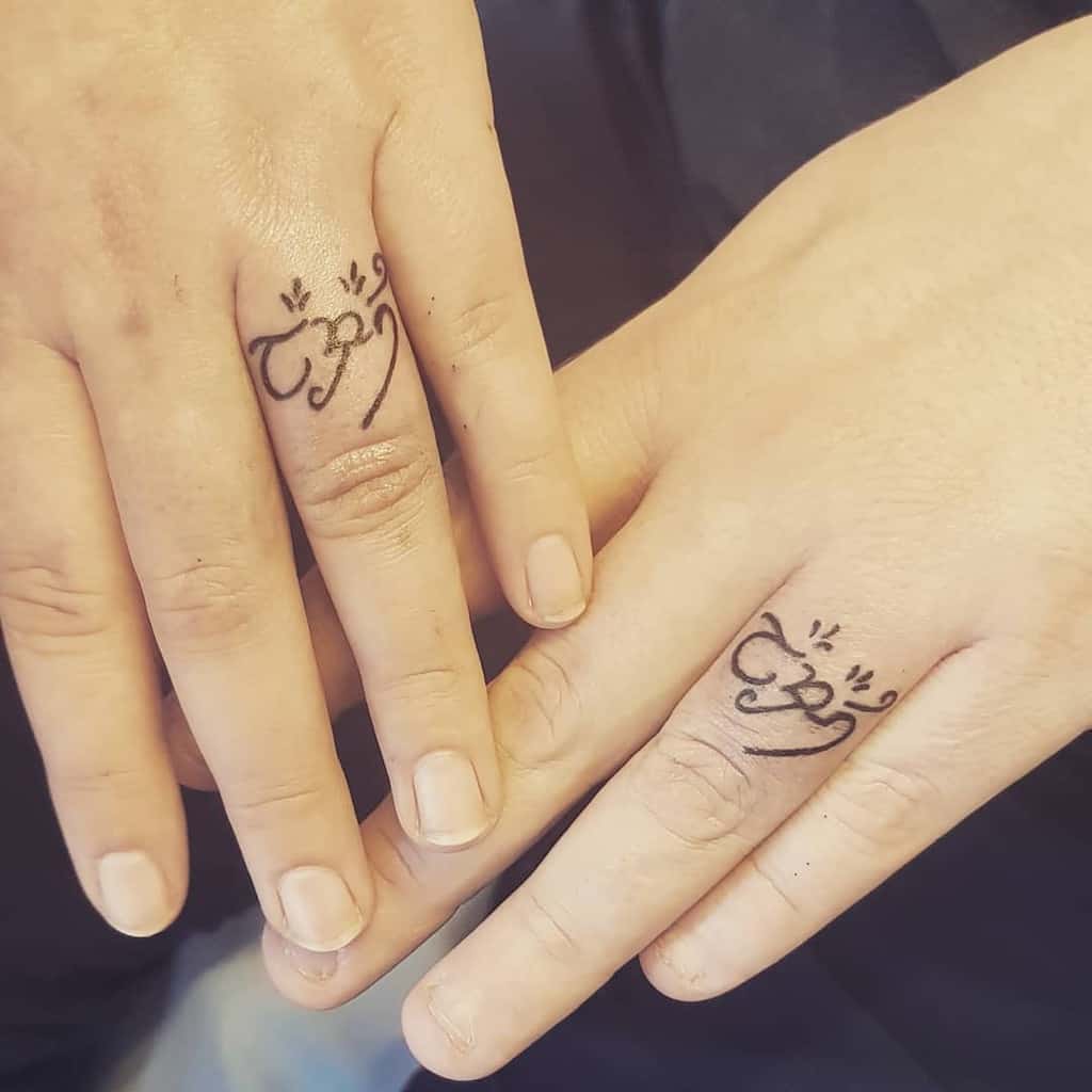 Matching Themed Wedding Ring Tattoo Ddraigpoppy