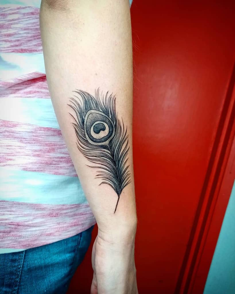 Peacock Feather Tattoo Design Krishna Tattoo Design  Peacock Feather  Tattoo Design Done by Mirage Tattoos in Dwarka Delhi India Tattoo idea  for first Timers Stay tuned follow us for more updates