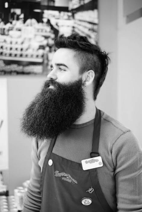 Medium Length Mens Undercut Hairstyle With Beard