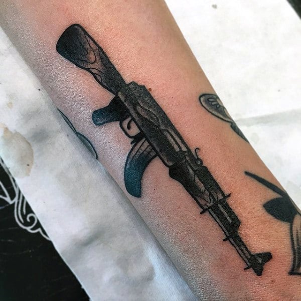 traditional color AK47 tattoo by Gary Dunn  Tattoos