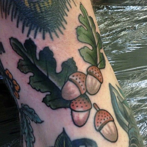 Mens Acorn With Green Leaves Tattoo On Legs