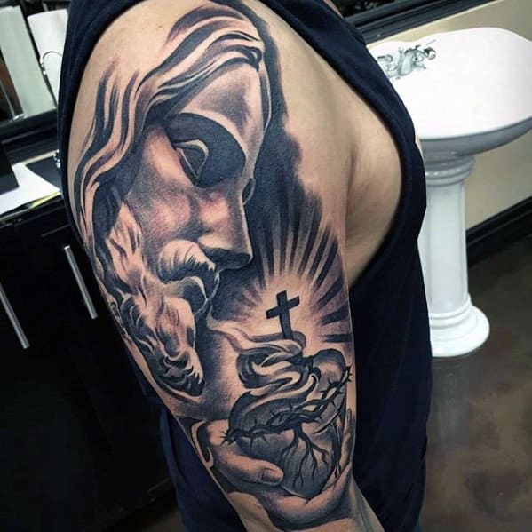 Mens Arm Tattoo Of Jesus Holding Sacred Heart