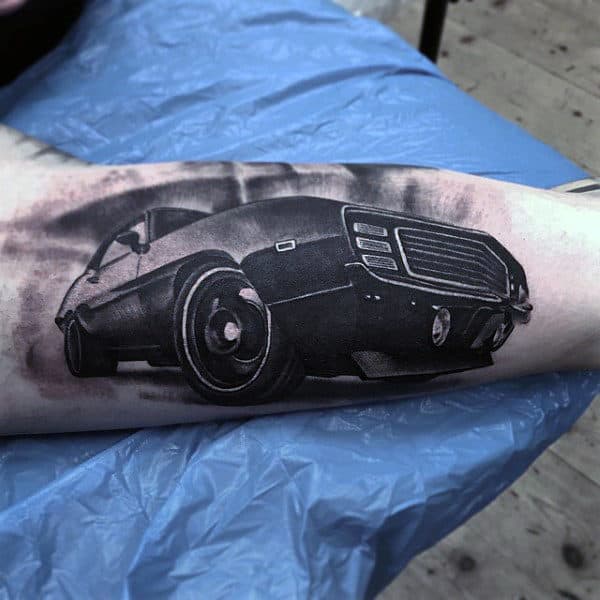 Mens Awesome Automotive Bicep Tattoo With 3d Design