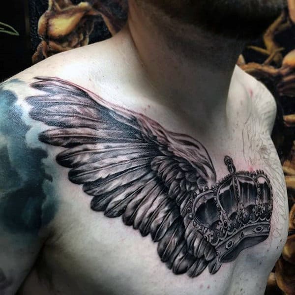 Mens Awesome Crown Tattoo With Feathers On Chest