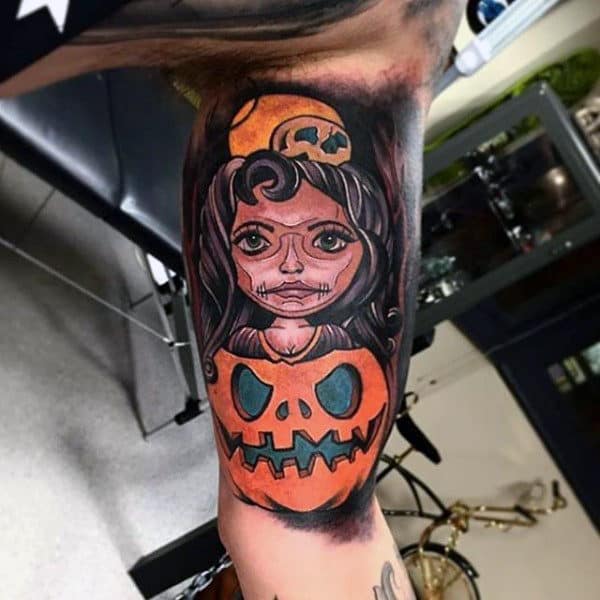 Mens Bicep Tattoo Of Female Inside Pumpkin